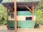 When you rent the cabin, you`ll also have access to a charming 1964 trailer with a full-sized bed 